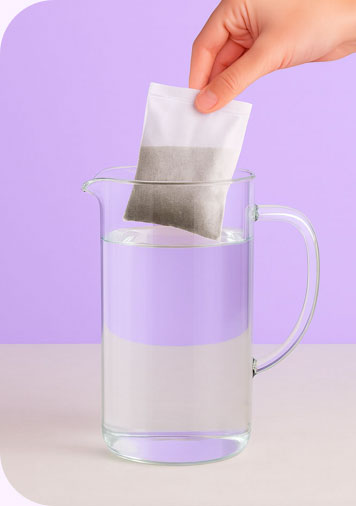 Dropping a bag of coffe into water