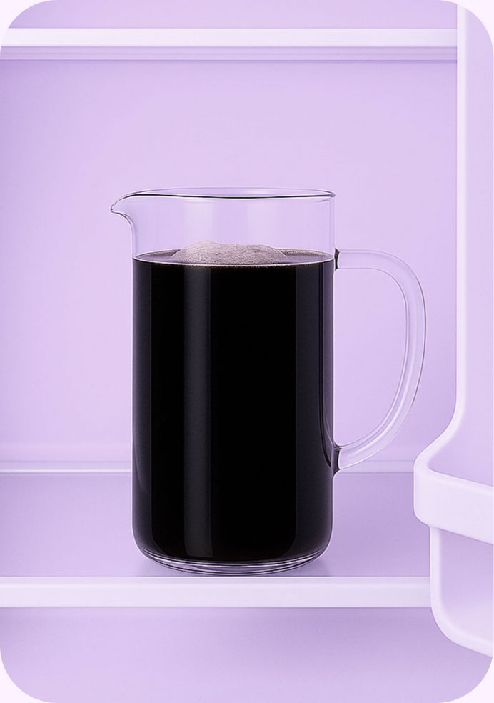 a pitcher of cold brew coffee in a fridge